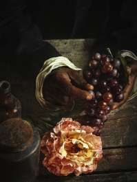 Hands with Grapes by Alanna Airitam 