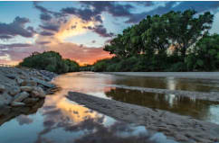 Tanque Verde Wash at Sunset by Ernie Schloss 