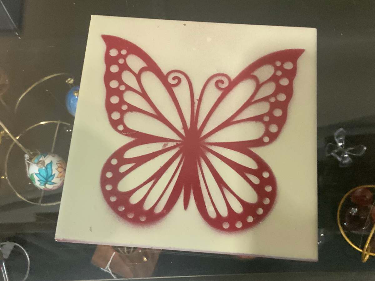 Small square trivet by Angelia Wilson, Image 1.