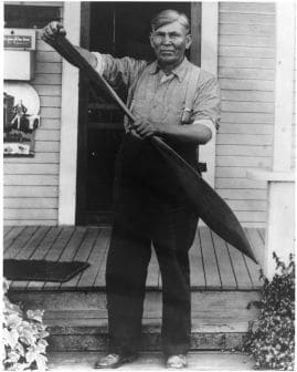 Joe Johnson with a paddle, 1920 by Charlotte Watts 