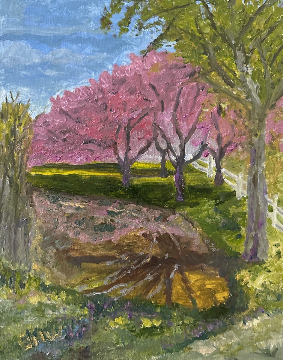 In the Rough by Brian Hugh Wagner  Image: A roadside pond reflecting blooming magenta colored trees hold the focus on a beautiful spring Colorado day.