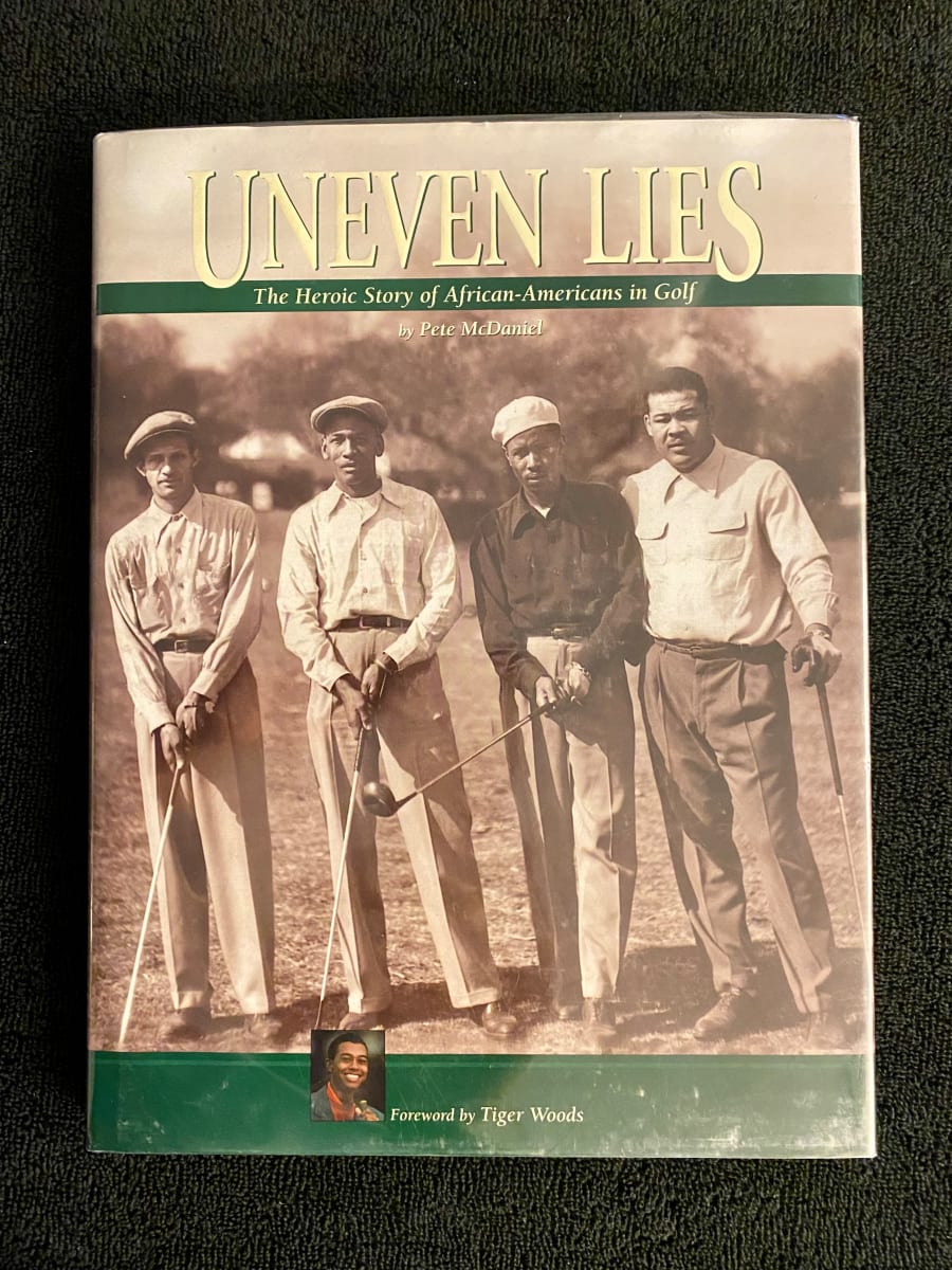 "Uneven Lies: Heroic Stories of African Americans in Golf" inscribed to George Davis by Pete McDaniel 