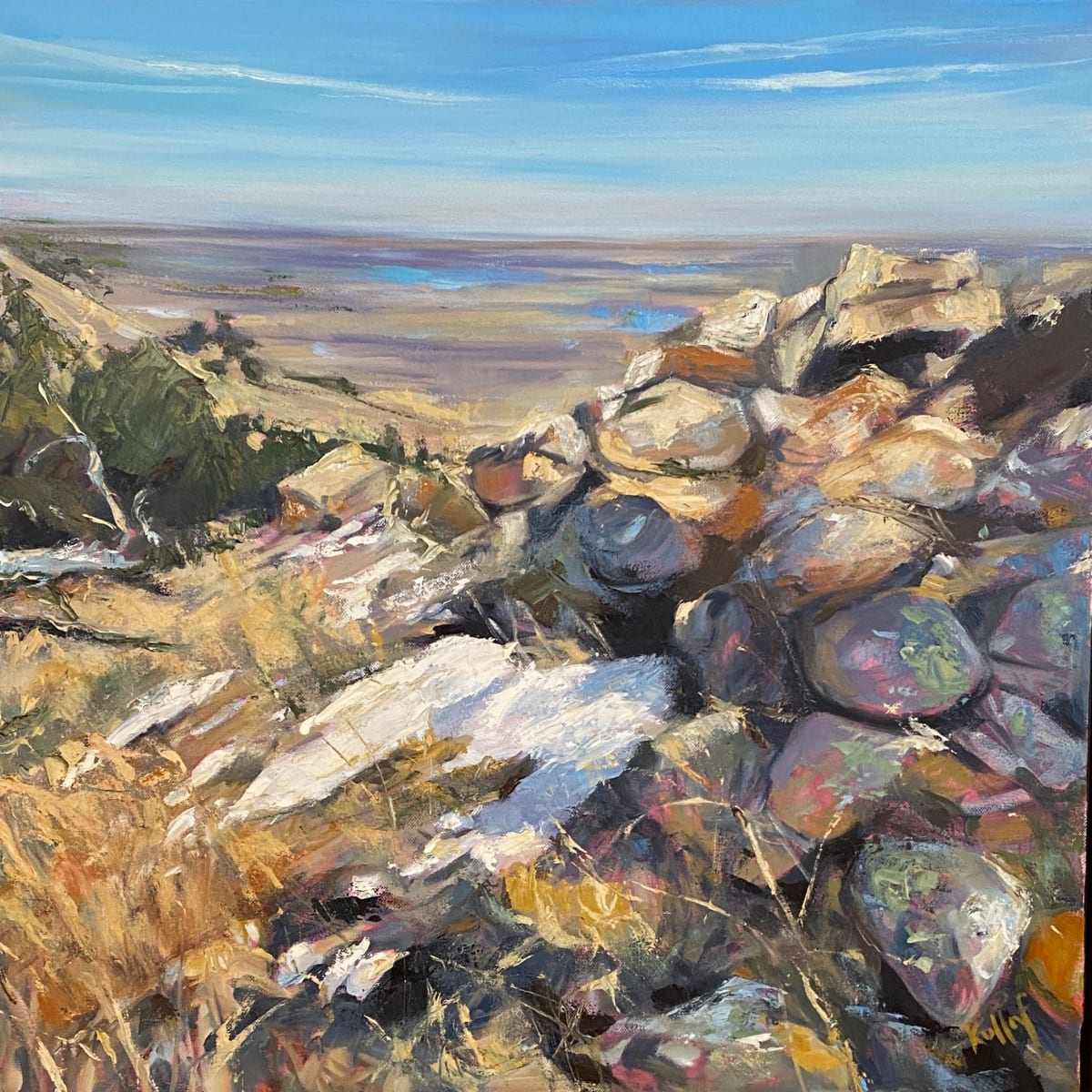 View from the Hogback Trail by Anne Kullaf  Image: An early spring view across the planes from the top of Boulder's Hogback Trail, a bit of snow clings to the rocks in the shadows that are filled with surprise colors.