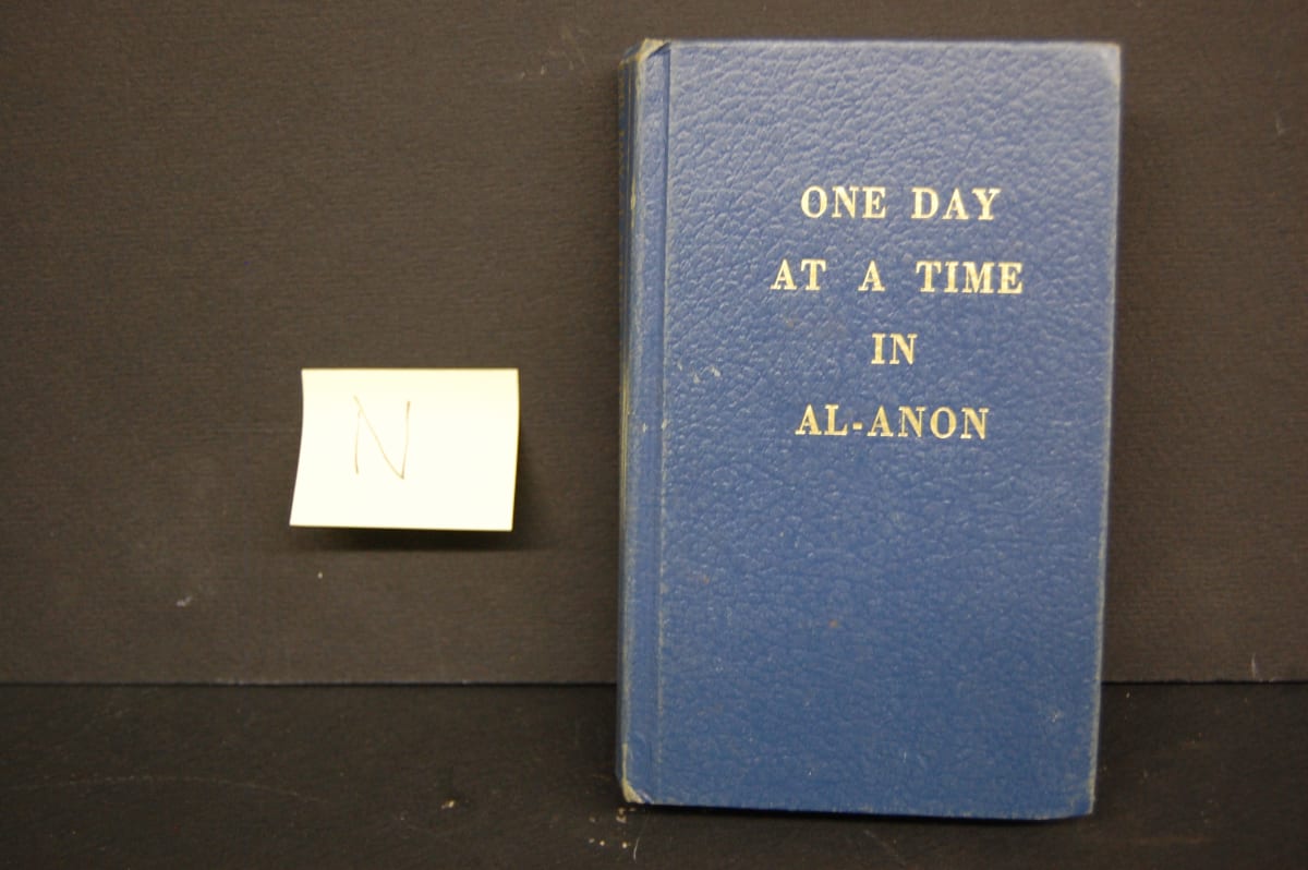 Untitled (Wall Shelf- "One Day at a Time in Al Anon") by Stella Waitzkin 
