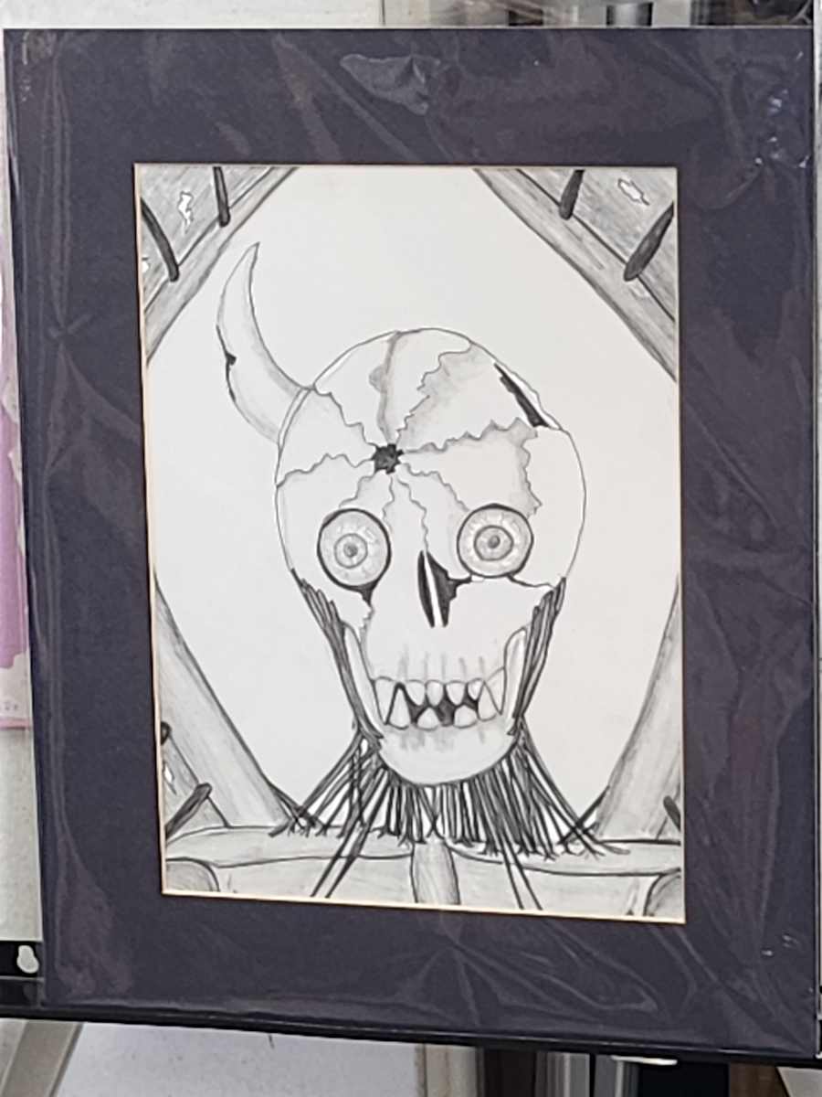 Demon Skull by Larry Alexis the junkart dog 