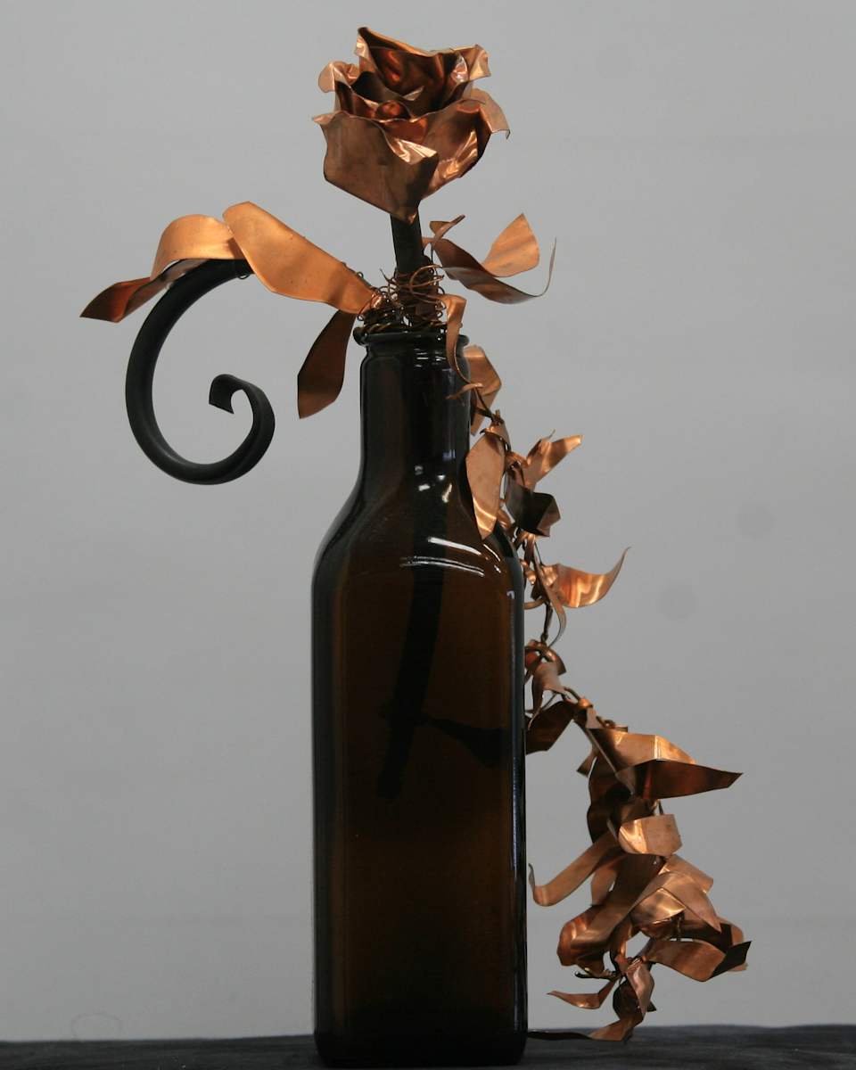 Rose in a Bottle by Larry Alexis the junkart dog 