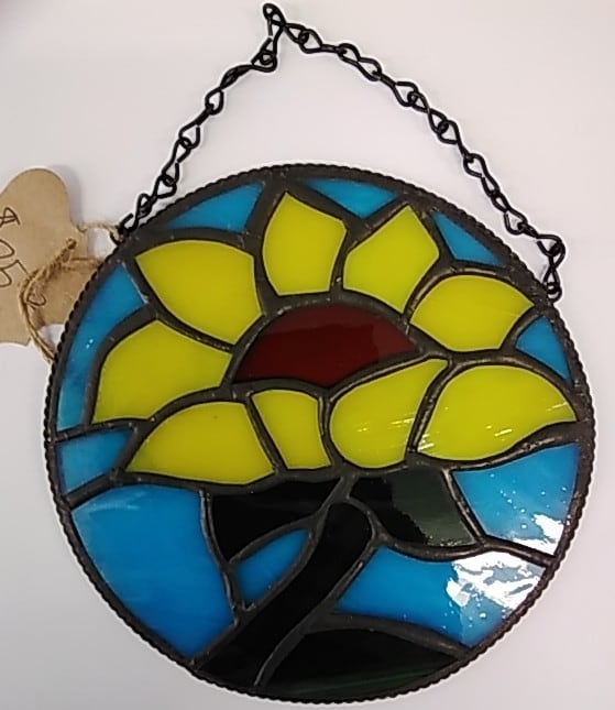 Sunflower with blue background, chain to hang by Craig Wills 