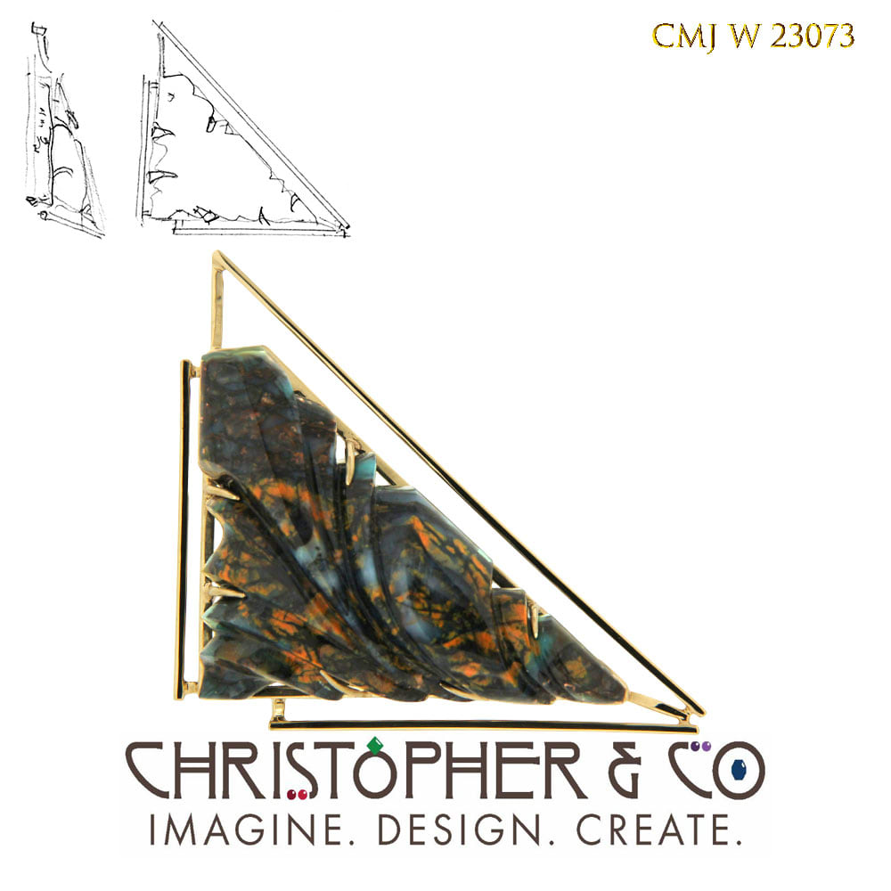 CMJ J 23073 One 14 karat yellow gold brooch designed by Christopher M. Jupp set with opalized wood carved by Nick Alexander. by Christopher M. Jupp  Image: CMJ J 23073 One 14 karat yellow gold brooch designed by Christopher M. Jupp set with opalized wood carved by Nick Alexander.