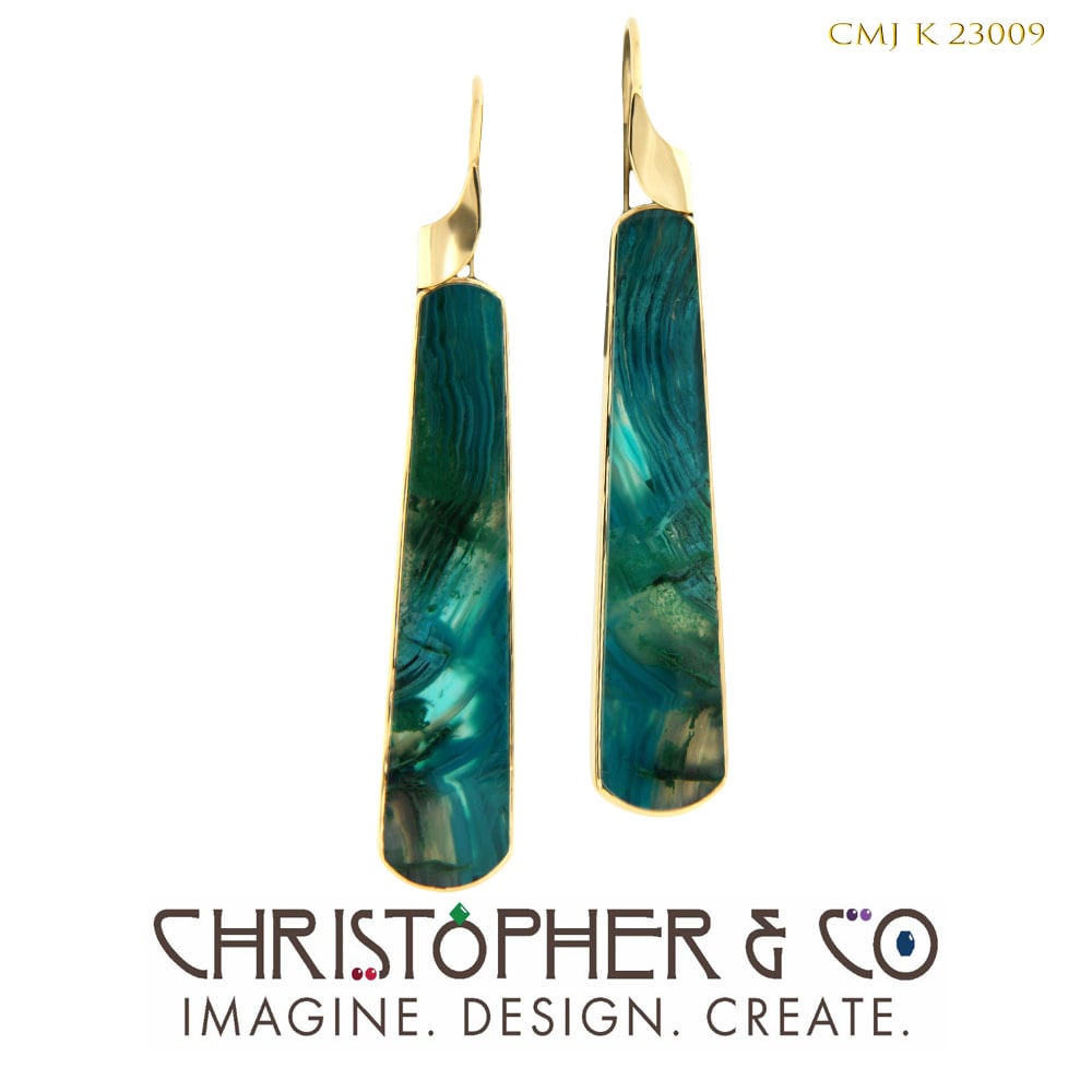 CMJ K 23009  Gold earrings designed by Christopher M. Jupp set with chrysocolla/malachite cabochons. by Christopher M. Jupp  Image: CMJ K 23009  Gold earrings designed by Christopher M. Jupp set with chrysocolla/malachite cabochons.