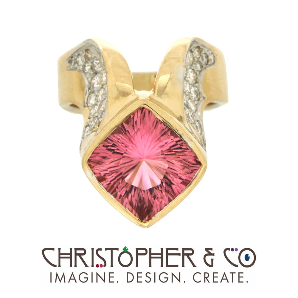 CMJ L 20068 Yellow and White Gold  diamond & pink tourmaline ring designed by Christopher M. Jupp.  Tourmaline hand cut by Richard Homer.  Image: CMJ L 20068 Yellow and White Gold ring set with diamonds and pink tourmaline.  Mounting designed by Christopher M. Jupp.  Pink Tourmaline hand cut by Richard Homer.