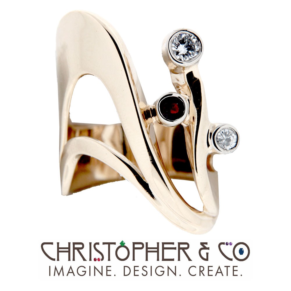 CMJ R 13112    Gold ring set with diamonds and garnet designed by Christopher M. Jupp.  Image: CMJ R 13112    Gold ring set with diamonds and garnet designed by Christopher M. Jupp.