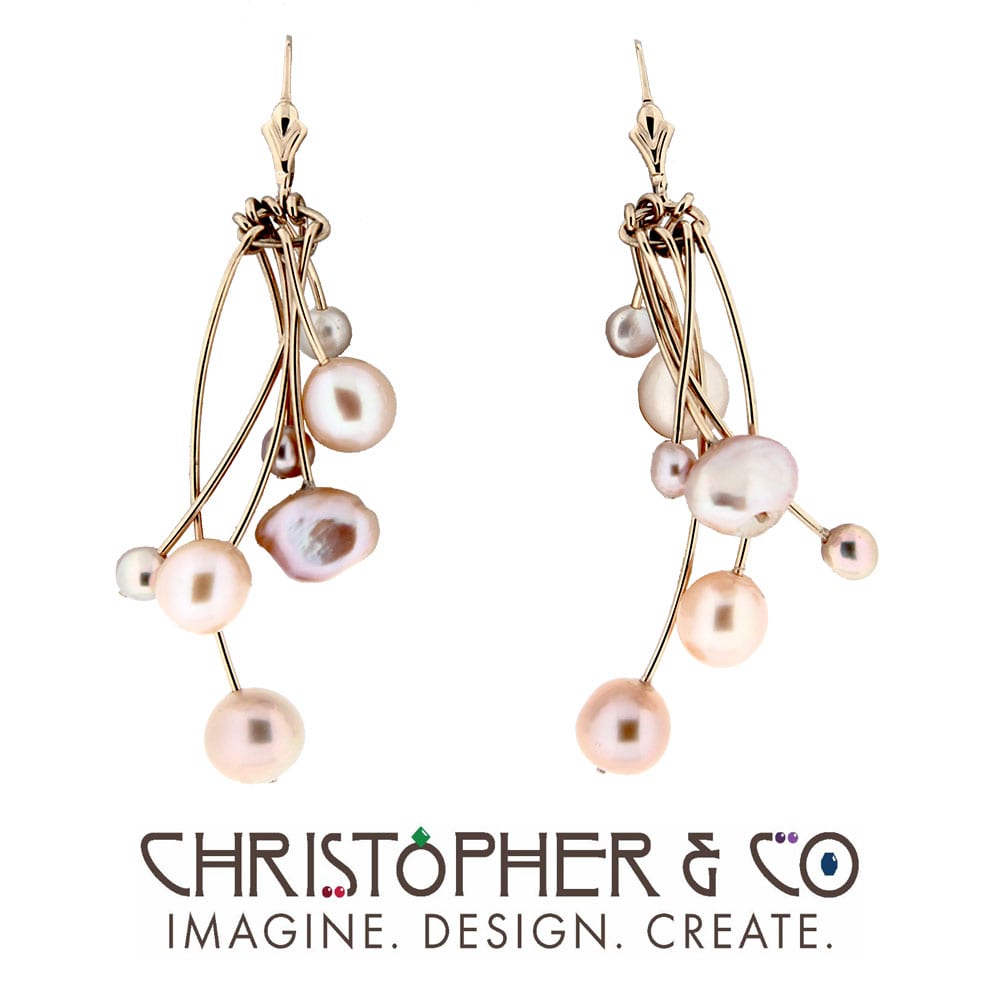 CMJ R 13139    Gold earrings set with soft pastel pearls designed by Christopher M. Jupp.  Image: CMJ R 13139    Gold earrings set with soft pastel pearls designed by Christopher M. Jupp.