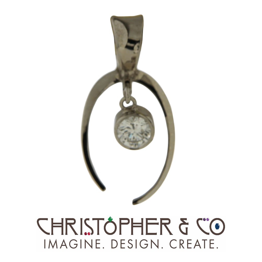 CMJ T 21051   White gold pendant designed by Christopher M. Jupp set with diamond.  Image: CMJ T 21051   White gold pendant designed by Christopher M. Jupp set with diamond.