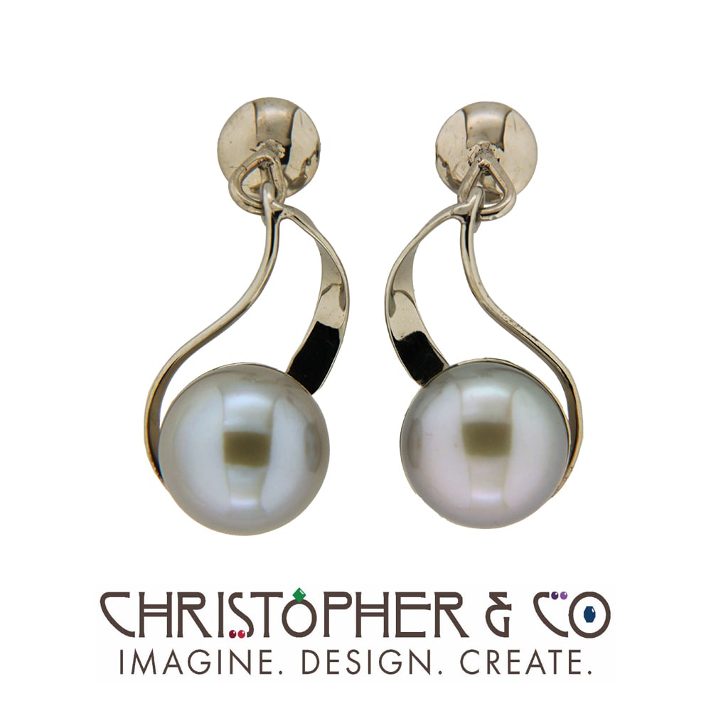 CMJ T 21053    White Gold earring pair set with pearls designed by Christopher M. Jupp.  Image: CMJ T 21053    White Gold earring pair set with pearls designed by Christopher M. Jupp.