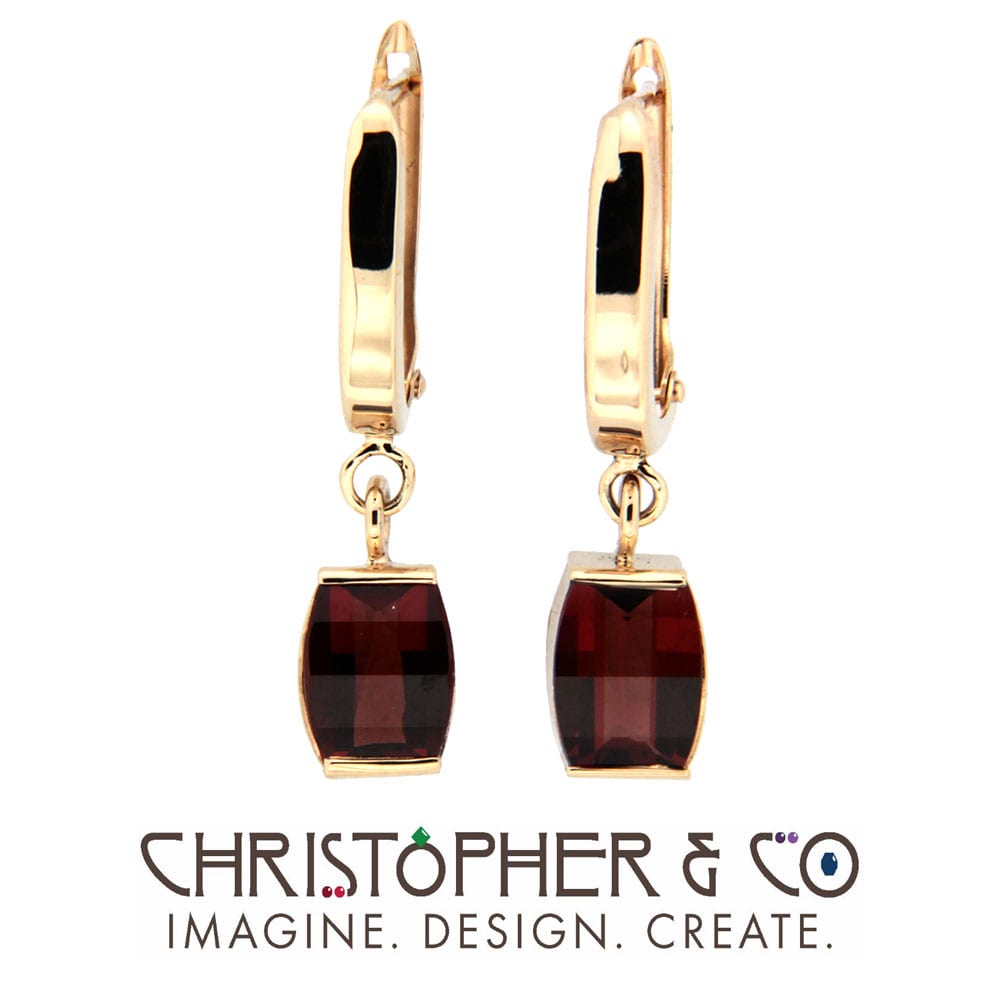 CMJ W 13096  Gold Drop Earring Pair designed by Christopher M. Jupp and set with Garnets  Image: CMJ W 13096  Gold Drop Earring Pair designed by Christopher M. Jupp and set with Garnets, 3.03 carats total weight.
