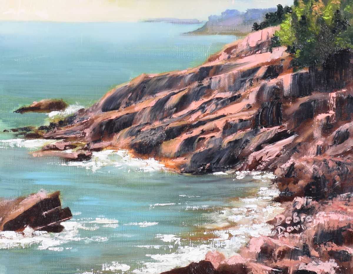 Where the Rocks Meet Light by Debra Davis  Image: There’s a certain strength in places worn by wind and wave. “Where the Rocks Meet Light” is a tribute to quiet resilience and coastal beauty.