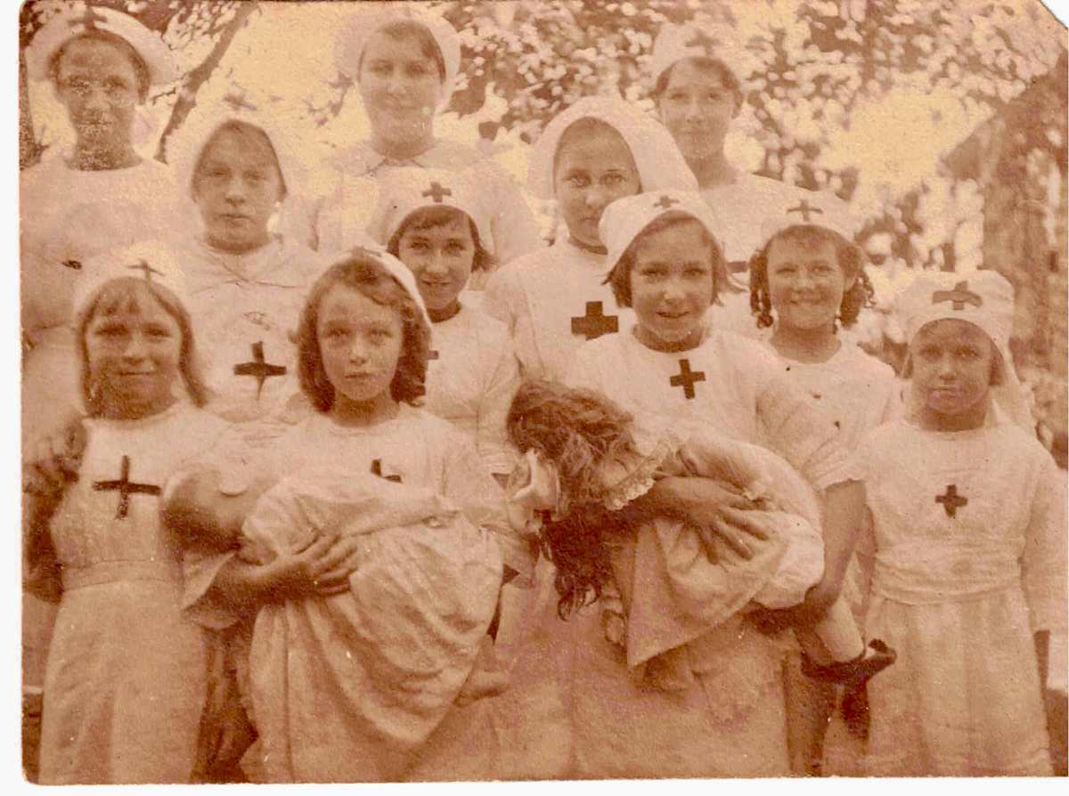 Young girls dress up as nurses at the Clifton School of Arts to raise funds for the Coledale Hospital. 1920  Image: Young girls dress up as nurses at the Clifton School of Arts to raise funds for the Coledale Hospital. 1920
Back row: Dorothy Johnston, Vera Chapman, Alma Ruth Johnston. 
Second row: Joyce Caiger, Edna Agetha Johnston (ringlets).
Front Row: Hazel Margaret Johnston (with doll), Ester Caiger
