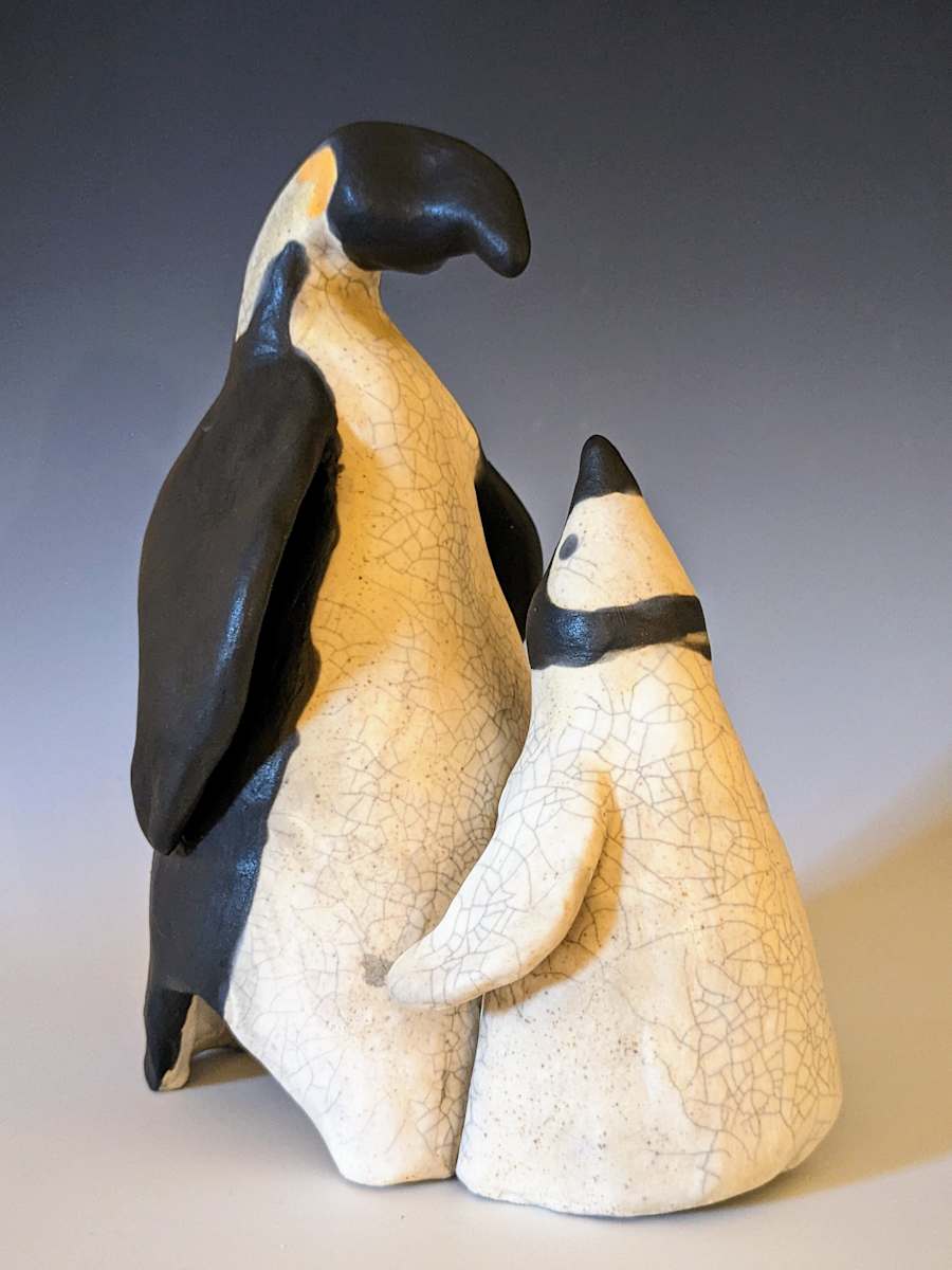 Penguin Dad and Chick by Nancy Jakubowski 