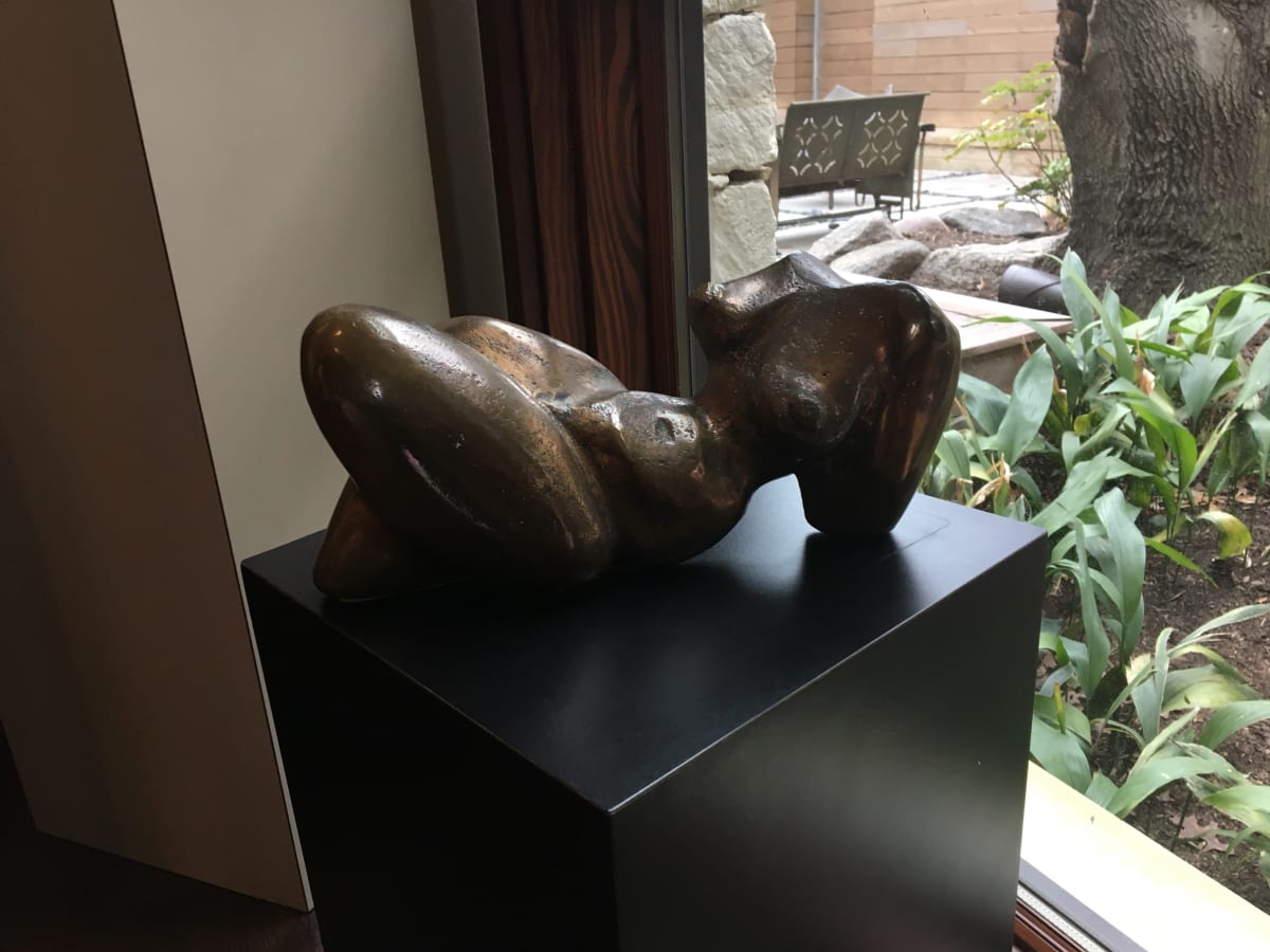 Reclining Woman in Bronze by Edith Baker 