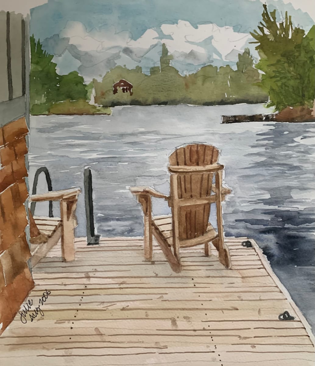 Cathy’s Dock, Lake of the Woods by Julie Ireton  Image: Two Adirondack chairs strategically placed at the end of the dock so that cottagers may pause,  rest, and fully absorb the view.