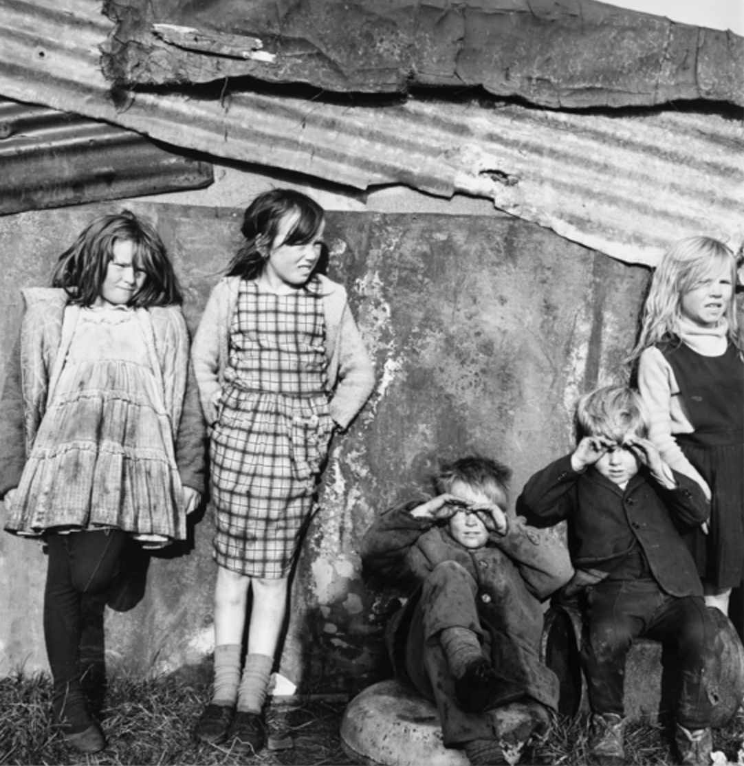 Children By A Tin Shed, Cherry Orchard, Dublin by Alen MacWeeney 