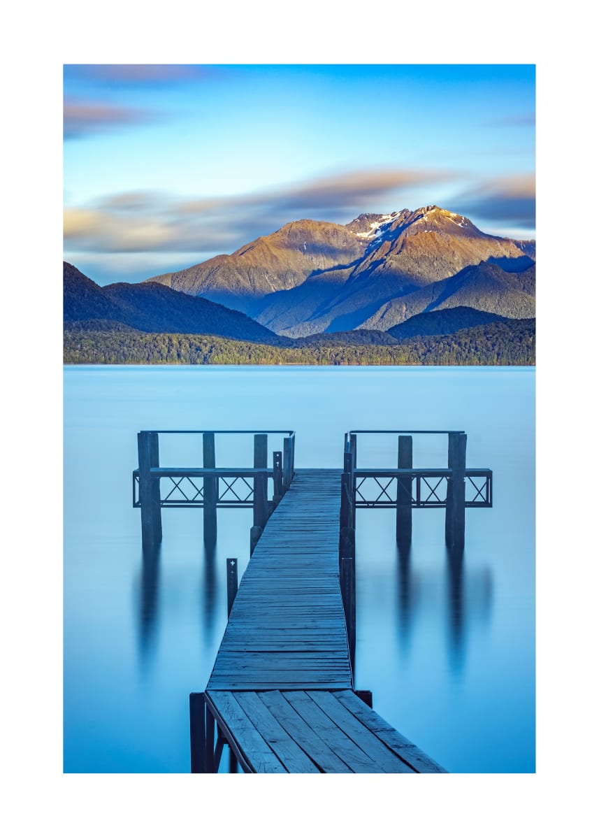 Reflective Lake  Image: Jetty and mountains at dawn