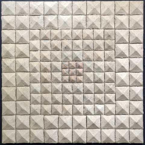 Pyramids by Elizabeth MacDonald  Image: Alt Text Long Description: A square tile pattern with a raised pyramid-like texture. It is composed of smaller square tiles arranged in a grid. Each tile has a pyramid shape with a square base and a pointed top, creating a textured and three-dimensional appearance. The tiles are predominantly beige with variations in shade, giving a subtle contrast and depth. In the center, there is a smaller cluster of darker beige tiles, which slightly contrasts with the surrounding lighter tiles. Note: the alt text was written with support from the ASU Image Accessibility Creator AI tool.
