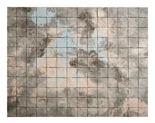 Sky by Elizabeth MacDonald  Image: Alt Text Long Description: A tiled artwork composed of small square tiles arranged in a grid pattern. Each tile is textured with a rough surface and features a mix of colors, primarily soft blues, muted browns, and pale pinks. The colors appear to blend and transition smoothly across the entire artwork, resembling an abstract or aerial landscape. The tiles create a patchwork effect, giving the artwork a mosaic-like appearance. The overall composition has an earthy, organic feel, with varying shades creating a sense of depth and movement. 
Note: the alt text was written with support from the ASU Image Accessibility Creator AI tool.