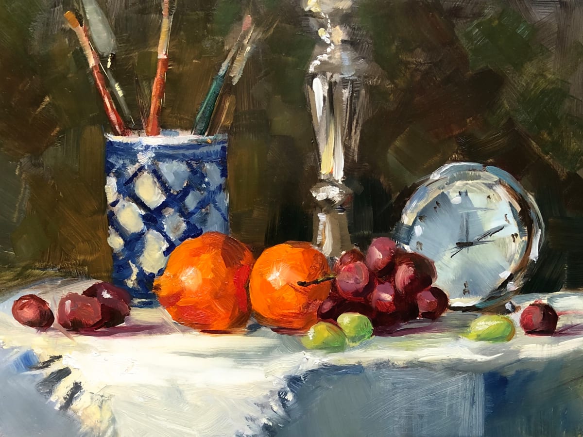 Tangerines by Cary Galbraith  Image: This still life has spontaneity. It combines fruit, silver and brushes in a blue porcelain cup. 