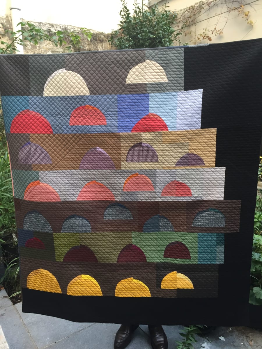 "2 Moons , 24 Suns"  Image: Improv quilt using recyled shirting and other cotton fabrics. 