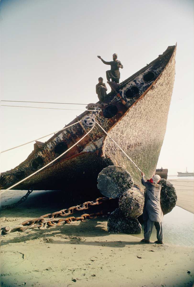 Untitled (Shipbreaker three men) by Kay Chernush, Image 1.