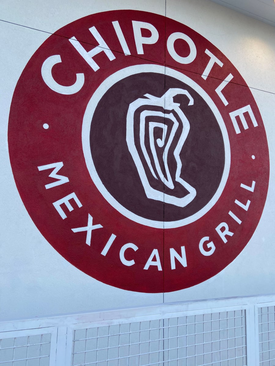 chipotle exterior logo mural by Dan Terry  Image: The 10' diameter logo speaks for itself. 