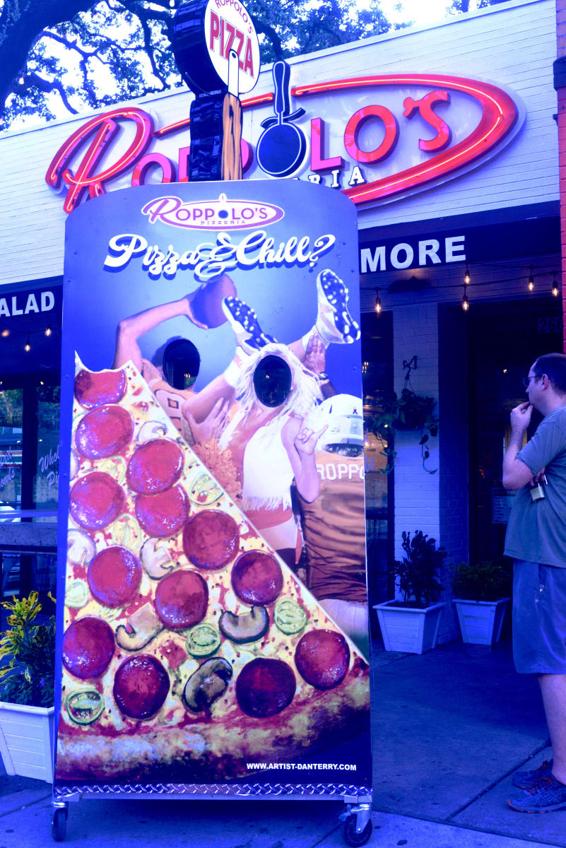 roppolo's pizza selfie2 by Dan Terry  Image: At the Guadalupe Street Roppolo's Pizzeria, this portable selfie mural is a favorite picture spot for diners, UT students and tourists to Austin. 