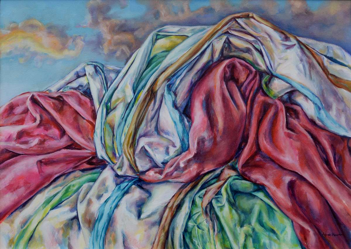 Mountain landscape by Agnes Havran  Image: The image is of a painting depicting a mountain range, but instead of rocks and earth, the mountains are created from colorful cloth fabric, resembling bed sheets. These sheets form the mountain's various valleys, peaks, and cliffs, imbuing the scene with a sense of volume and three-dimensionality. The choice of colors, focusing largely on pinks, reds, and blues, adds to the scene's movement, highlighting the mountain's wrinkles and creases as if caught in a gust of wind. The mountain stands strikingly against a serene blue sky dotted with white clouds. This vibrant representation combines elements of realism and abstract art, presenting a familiar landscape in an entirely novel and imaginative way.