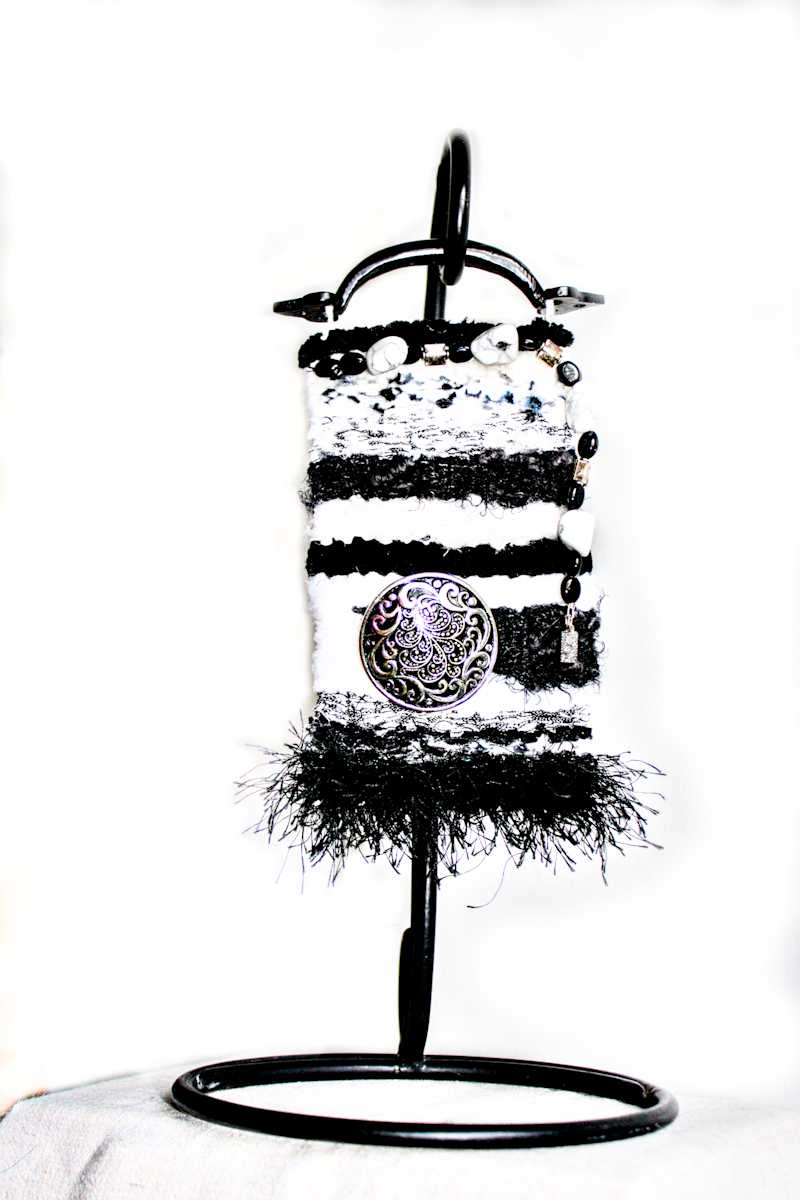 Peaceful Resilience  Mini Art Tapestry by Annette  Image: Use a metal or ornamental ornament hanger to showcase this mini tapestry on a shelf. They do not come with the hanger. 