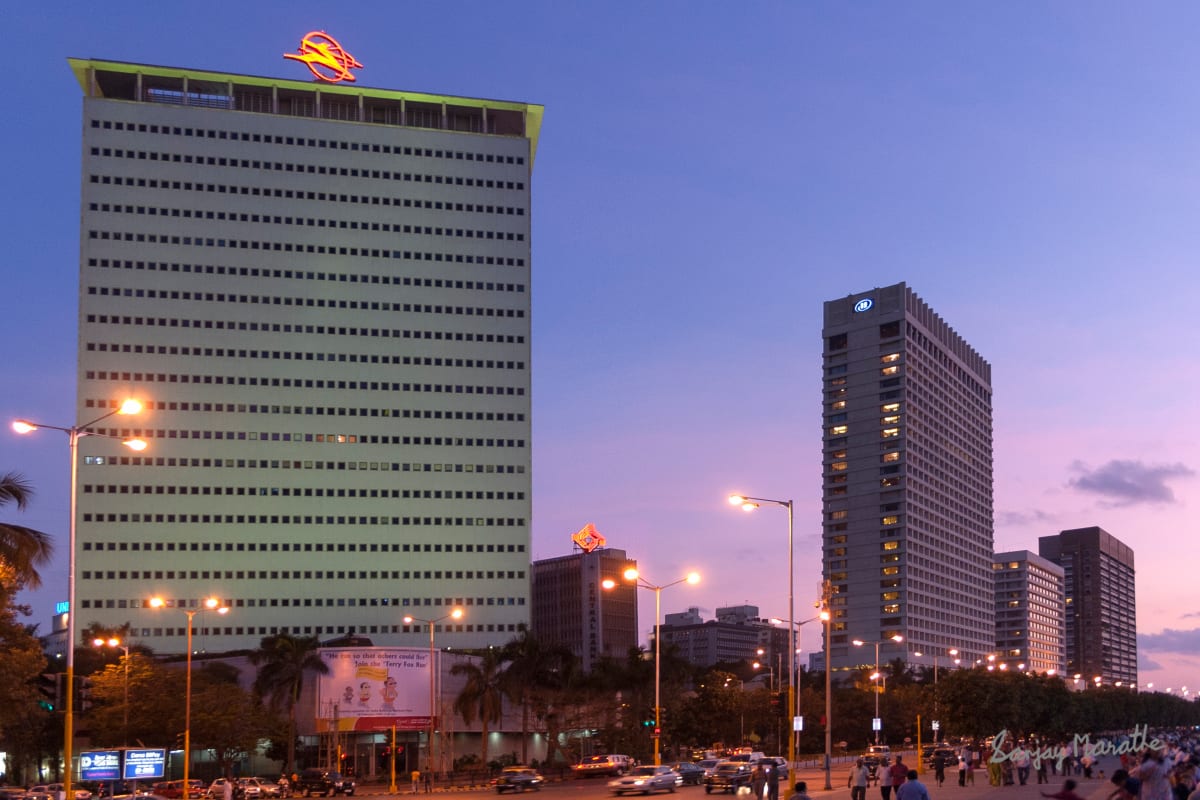 Air India Tower, Mumbai (2007) by Sanjay Marathe  Image: The iconic 23 storey tower on the Marine drive, stands out against the blue and pink sky at dusk. The building served as the Air India headquarters till 2013, when the HQ shifted to Delhi. 
