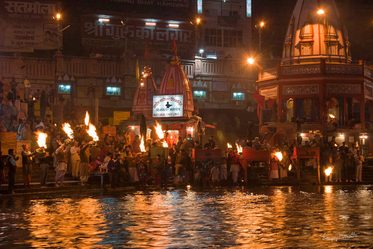 Ganga Aarti-2, Haridwar (2005) by Sanjay Marathe  Image: Witnessing and photographing the Ganga Aarti at Har-Ki-Pauri in Haridwar is a truly special experience. As dusk settles, pilgrims, tourists, and priests gather along the riverbank to worship Goddess Ganga, affectionately called ‘Ganga-ji.’ Earthen lamps (diyas) and flowers drift on the water, accompanied by the rhythmic chanting of mantras and the ringing of bells. The atmosphere is both electrifying and peaceful. Words can hardly do justice to the moment, but this is my attempt to capture its essence despite the challenge of low light and handheld photography.