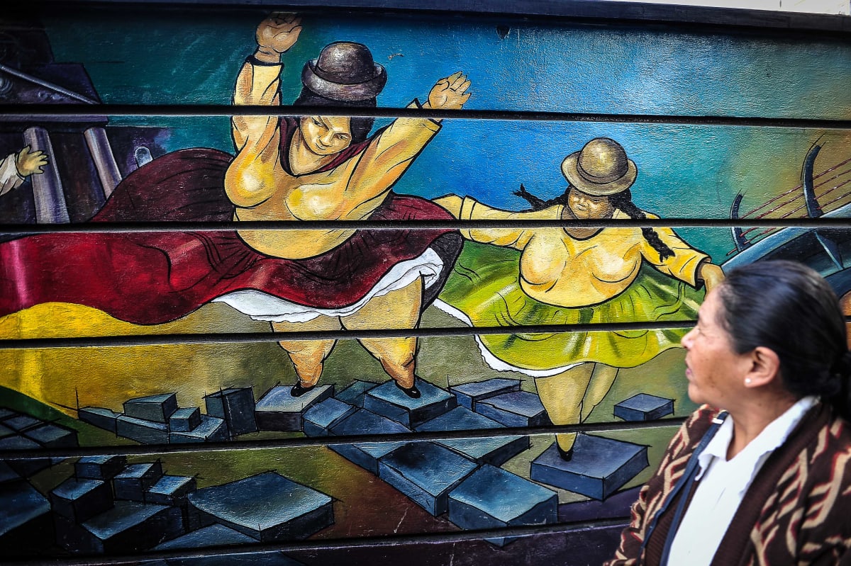 Untitled (Flying Cholitas mural)  Image: A mural painting depicting "flying" cholitas recalls the show of the fighting women "the Cholitas Luchadores".