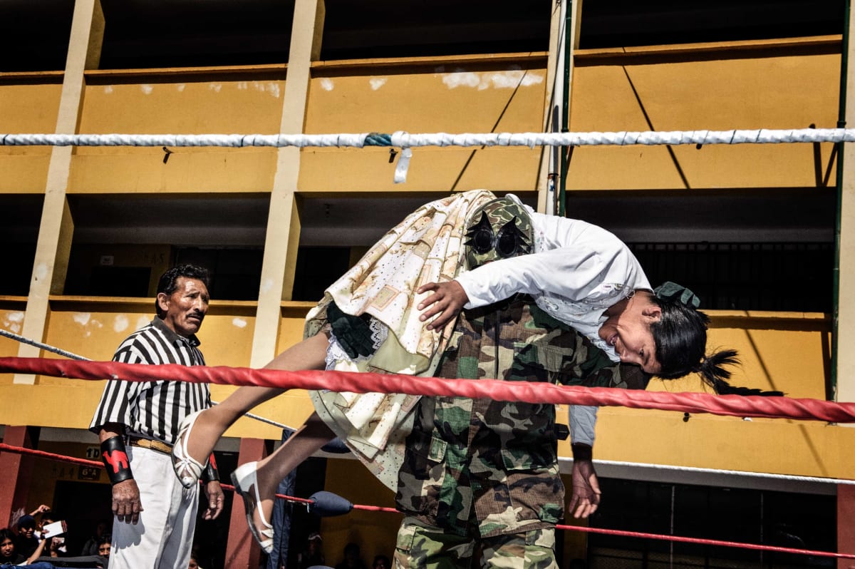 Untitled (Family Match)  Image: Dina and Santos - husband and wife - face each other on the ring.