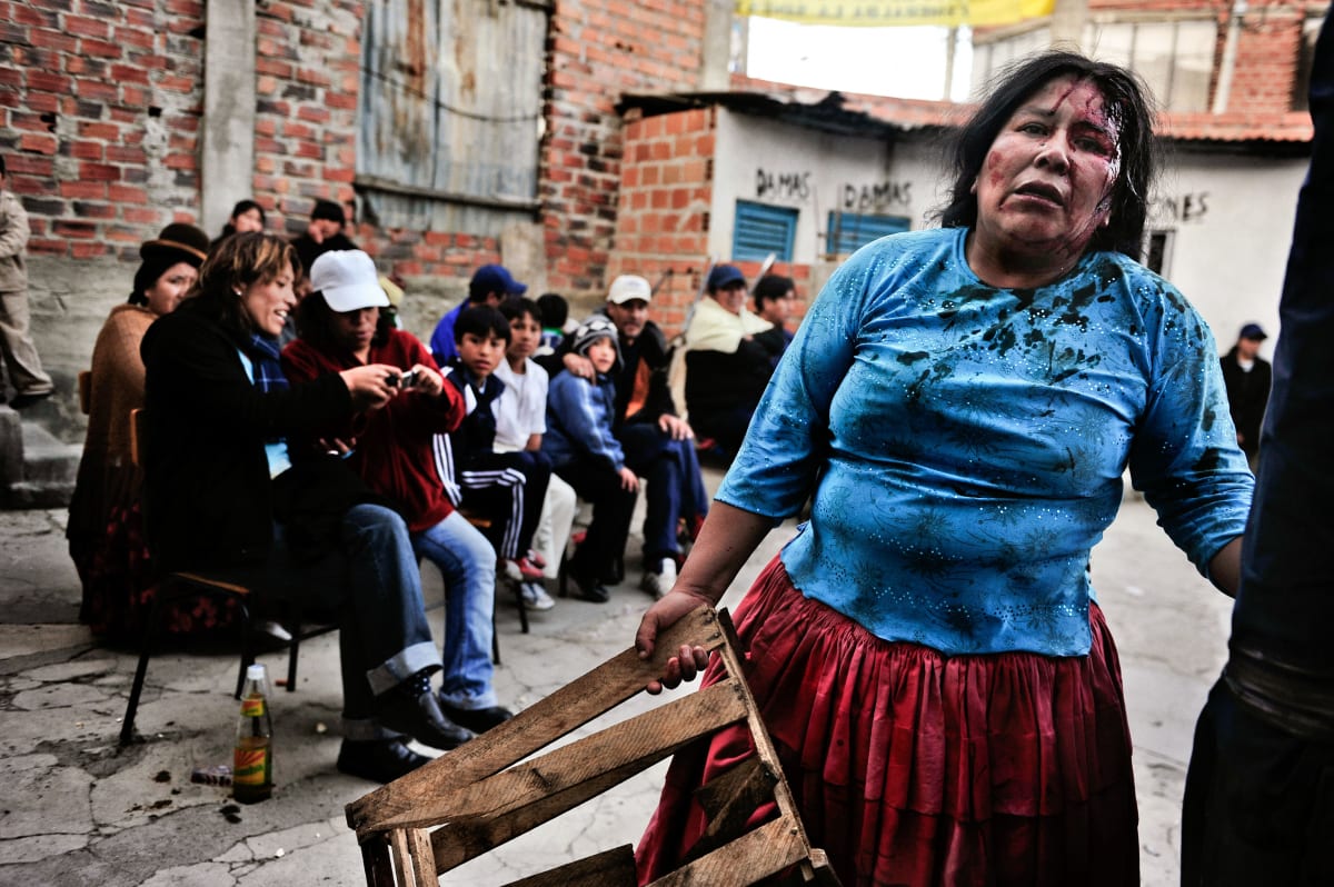 Untitled (Wounded)  Image: Carmen Rosa picks up the wooden box before seeking revenge for her wounds.