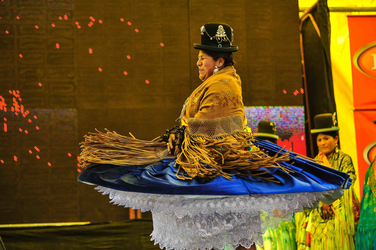 Untitled  Image: A cholita dancing the morenada during the event of Miss Cholita 2010.