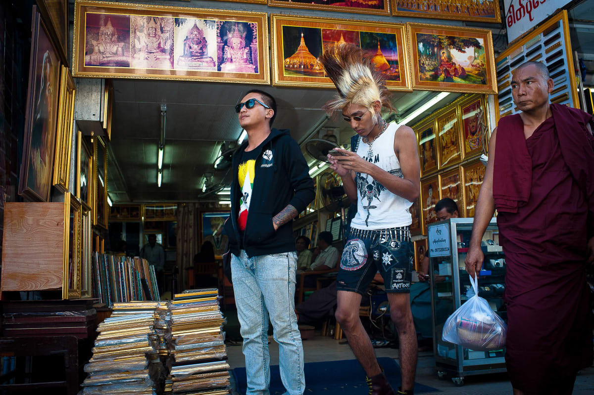 Untitled  Image: Sid in front of a print shop in Burma, Myanmar.