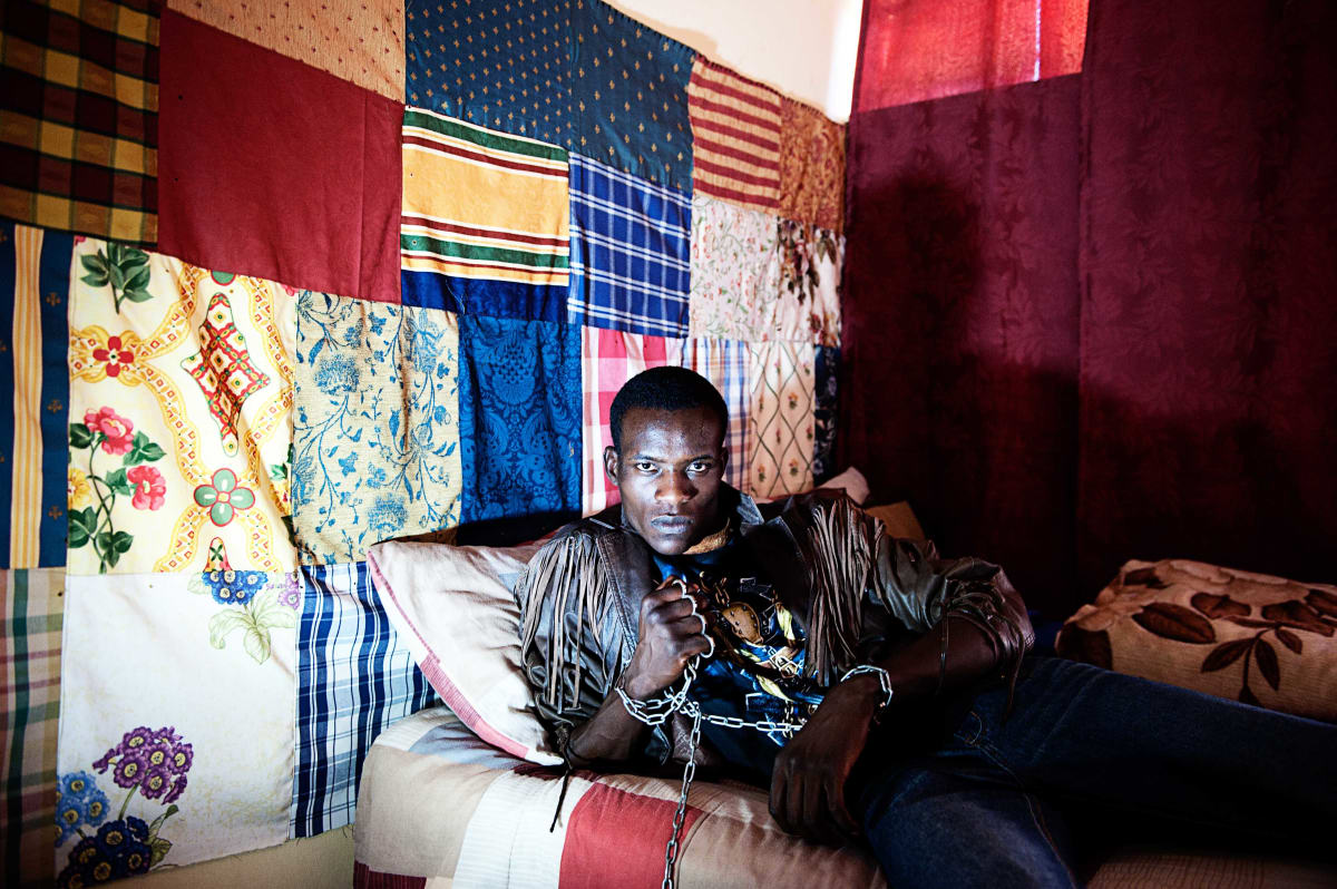 Untitled (Ono Joe)  Image: Ono Joe, a soldier, in his room at the militar camp of Gaborone.