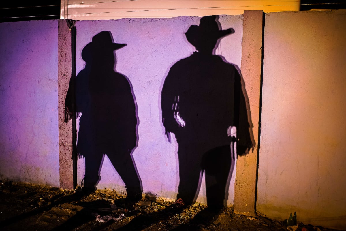 Untitled (Shadows)  Image: Shadows of two metal cowboys.