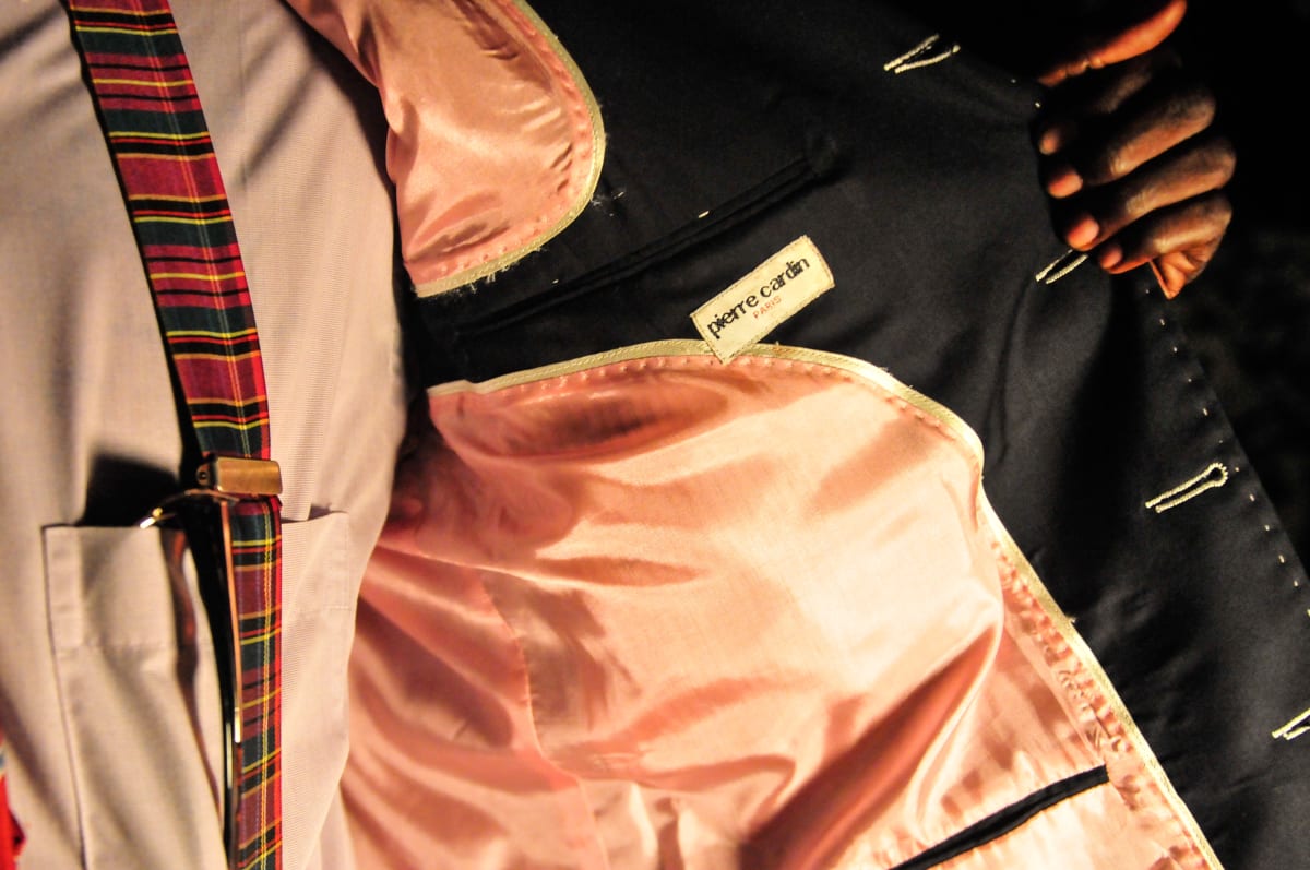 Untitled  Image: Detail of the inner lining of a Pierre Cardin black and pink satin jacket. Brazzaville, Congo (2008)