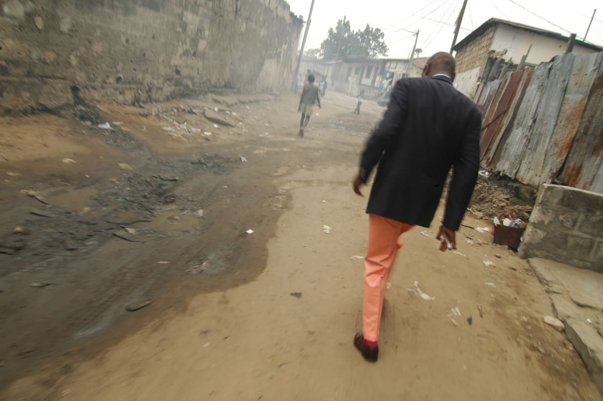 Untitled  Image: Salvador Hassan walking down the streets of Brazzaville. Congo (2007)