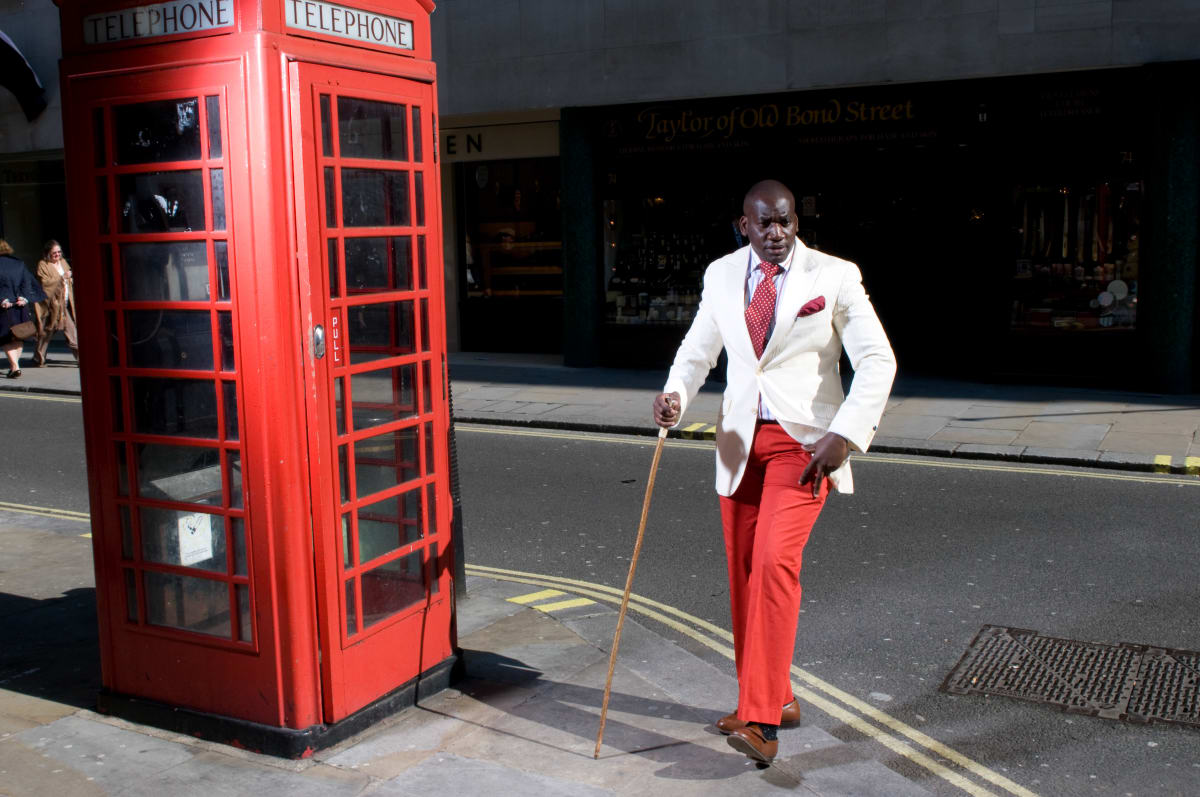 Untitled (Dixy in London)  Image: Dixy Ndalla, Congolese man who lives and works in London as a  broker as well as for the Congolese embassy. He became a Sapeur once he came to London, as he started making enough money to afford the suits. He is the best client of Favourbrook in Jermyn Street, where he learnt how to become a real Dandy. London, UK (2009)