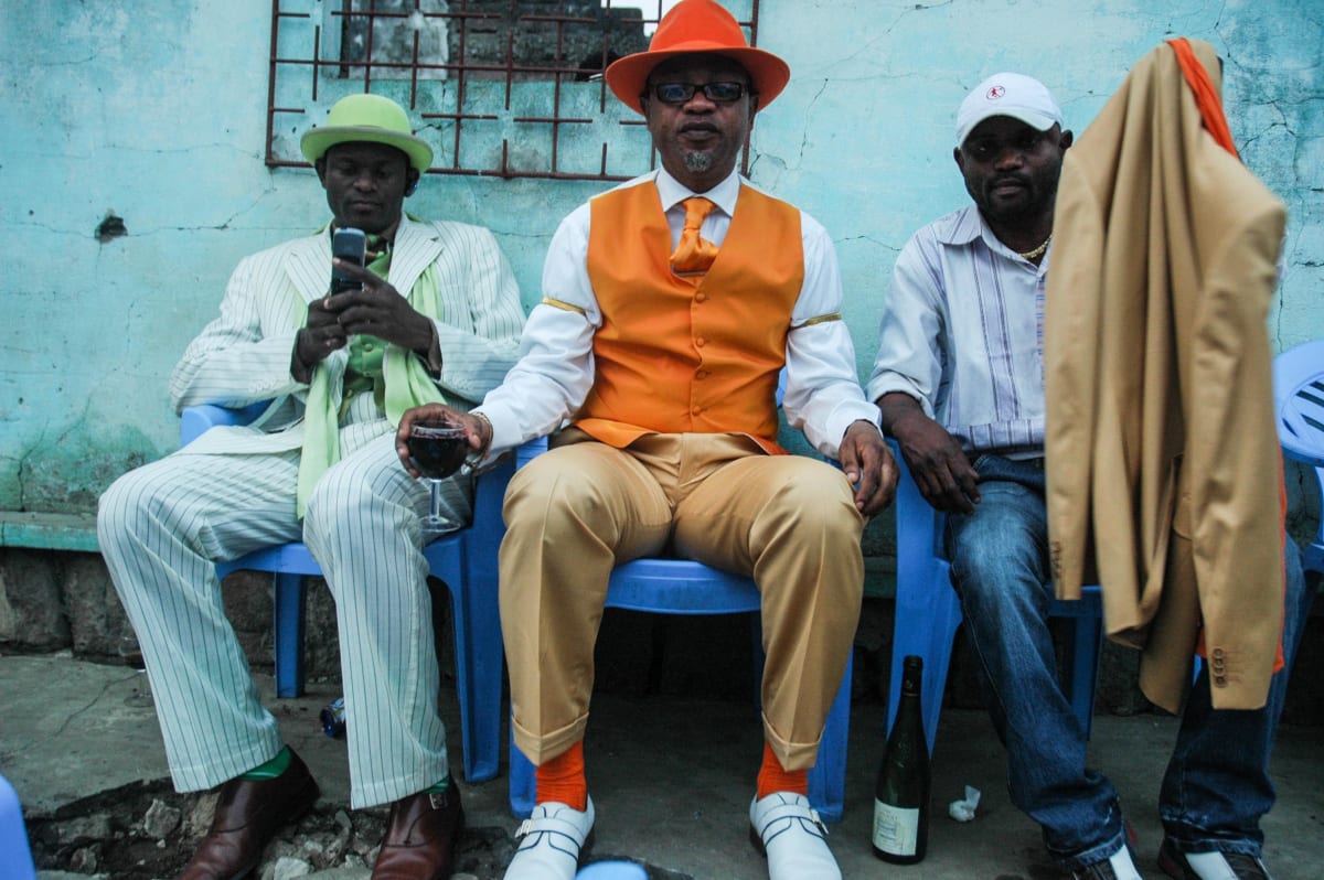 Untitled  Image: Kvv Mouzieto (center) sitting with his brother (left) and a friend during a party. Brazzaville, Congo (2007)