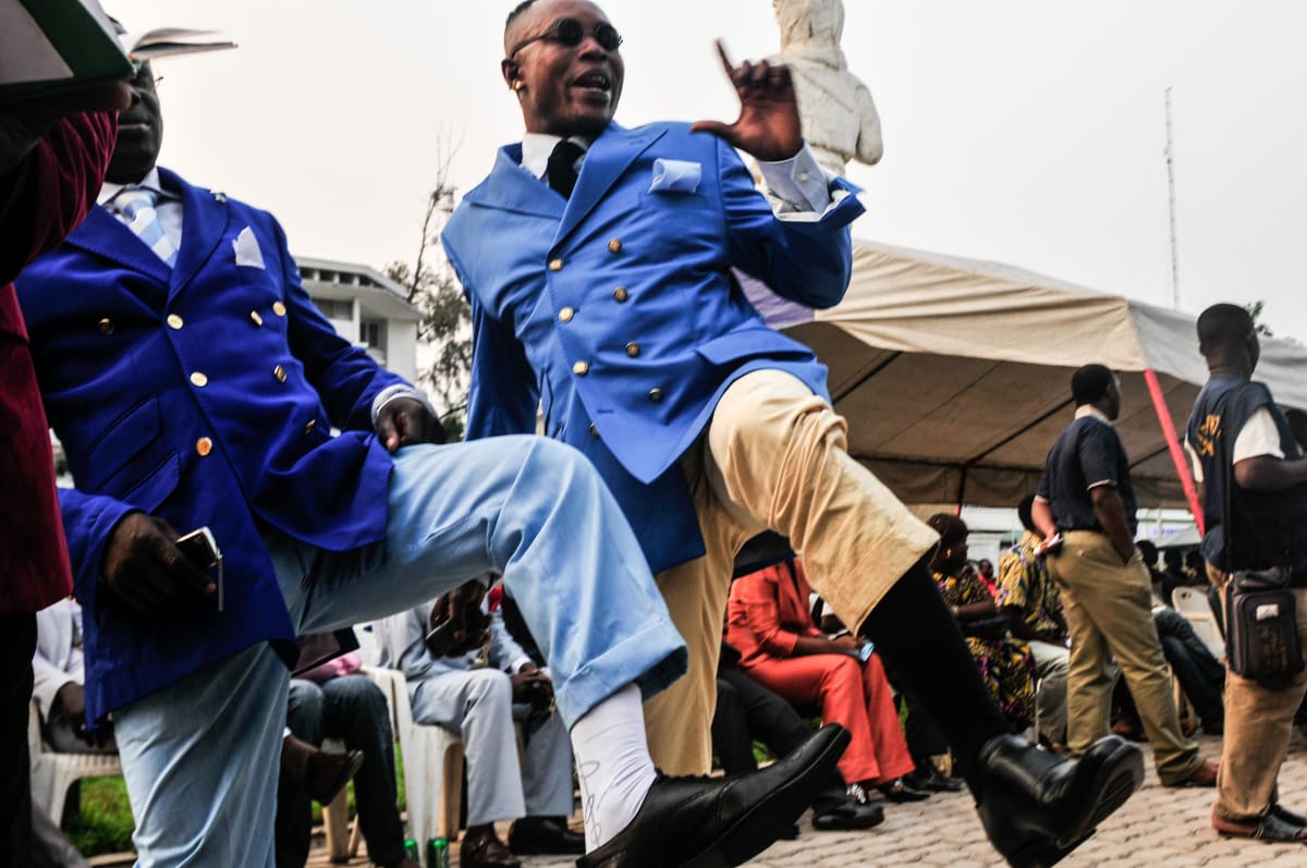 Untitled  Image: Dany Blaise performing at a party with friends. Brazzaville, Congo (2008)