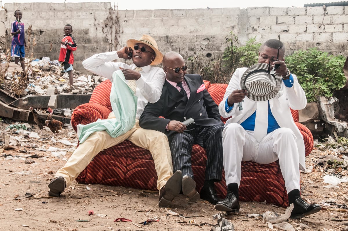 Untitled  Image: Dany Blaise, Mayembo and a friend sitting together playfully on a couch. Brazzaville, Congo (2008)